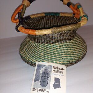 Ten by three: Hand made by Aenwana. Beautiful multi color weaved basket w/handle